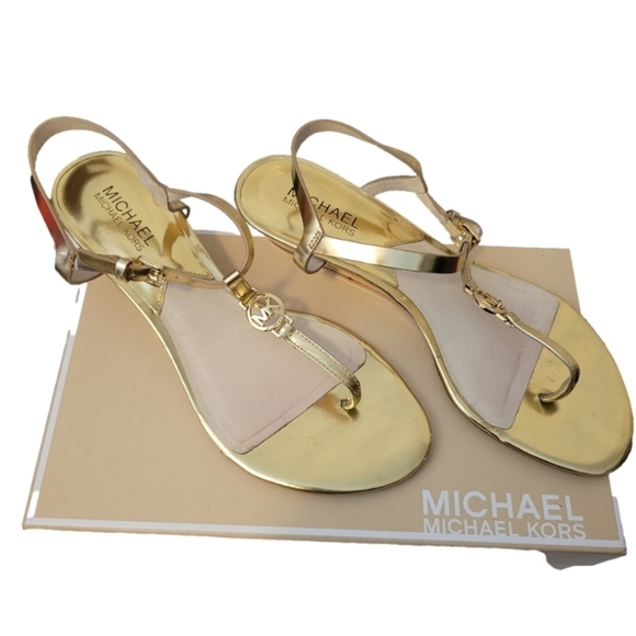 Michael Kors Shoes - Michael Kors Gold Nora Wedge with box size 8